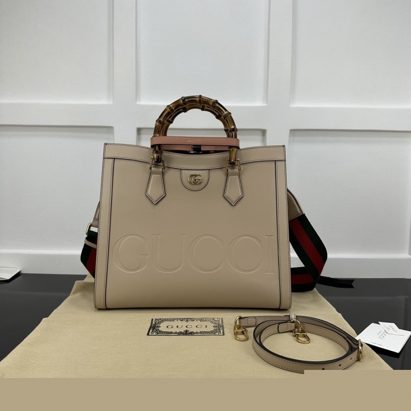 G*u*i shopping bags